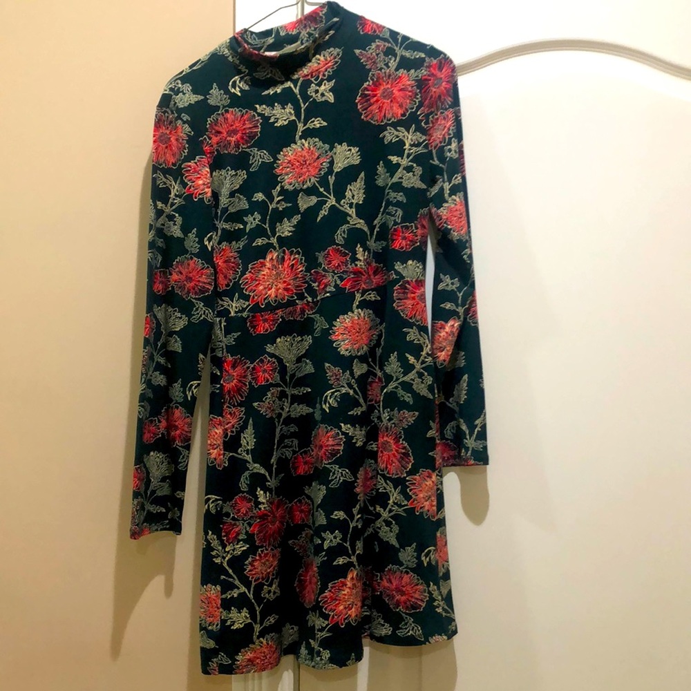 Green, cream, and red floral print dress.